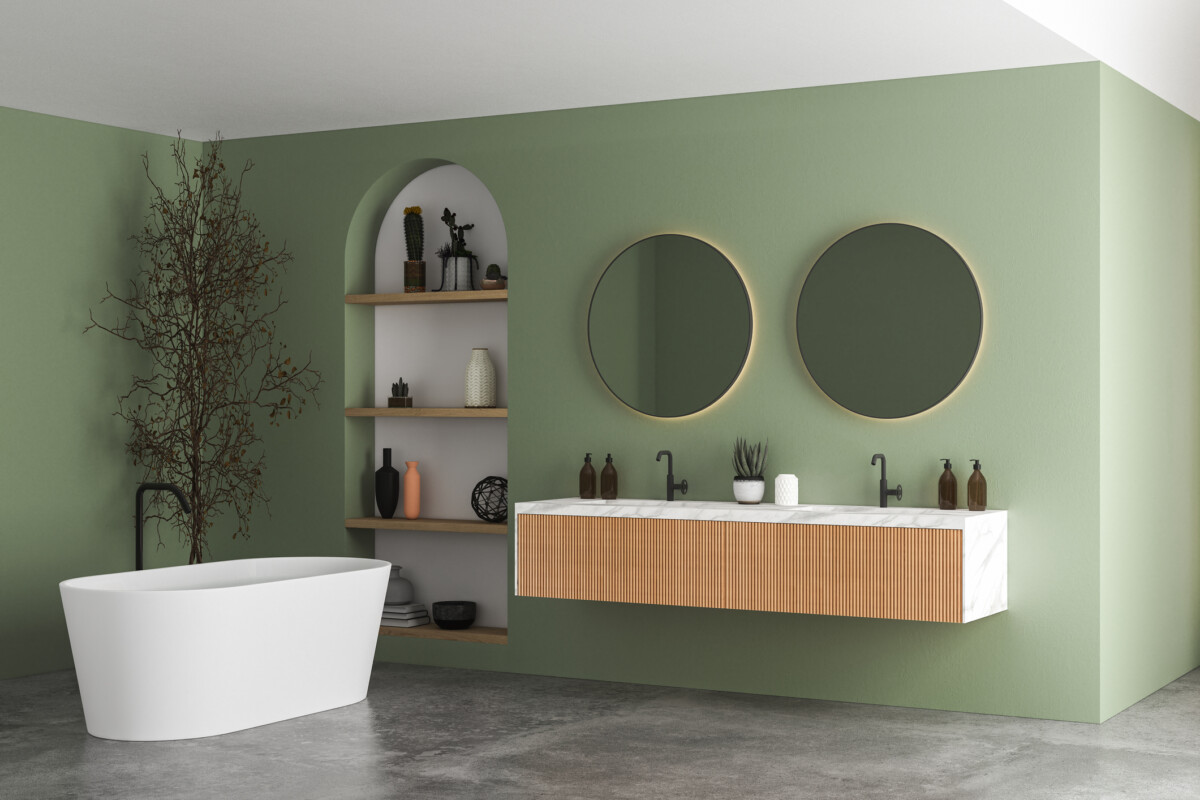 Modern bathroom interior with green and white walls, shower area, basin with mirrors, shelf, bathtub and grey concrete floor. 