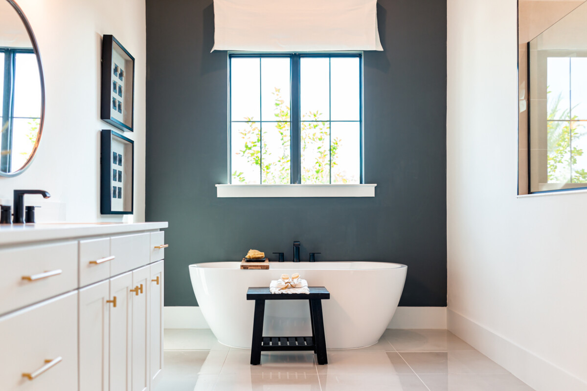 Bathtub in navy blue bathroom