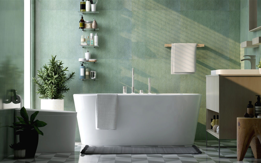 Modern luxury bathroom with freestanding bathtub, toilet, vanity washbasin, and open shelving in a green colour scheme.